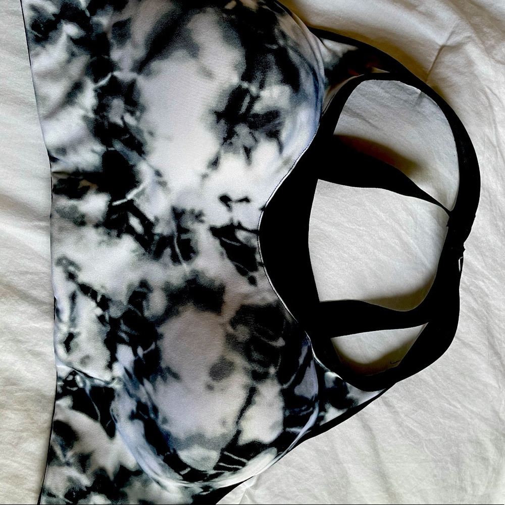 Pink sports bras with built in cups. Size extra large. NWOT.